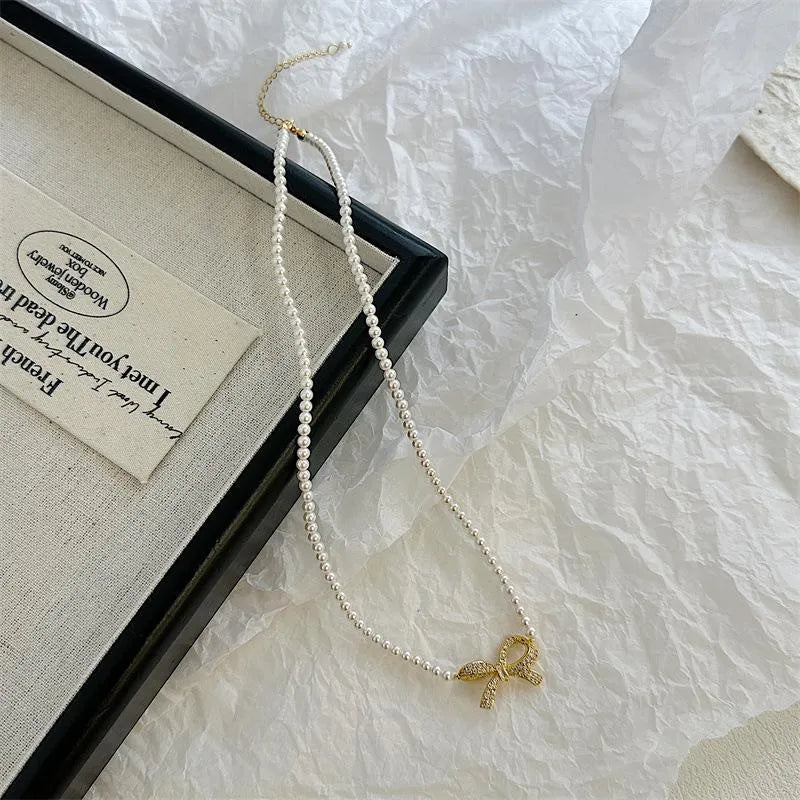 Bow Shape Pearl Korean Necklace (PQT-992)