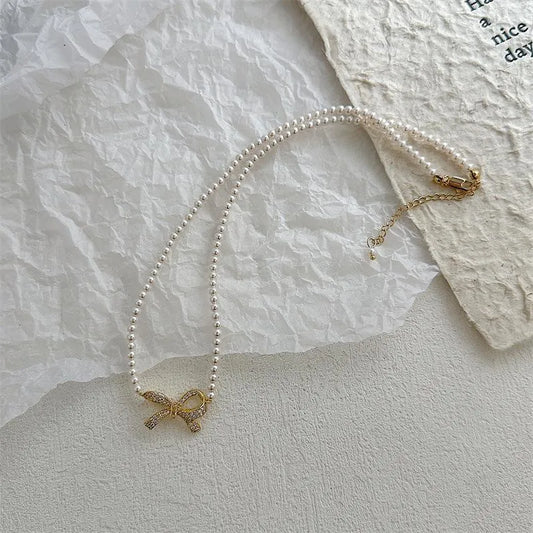 Bow Shape Pearl Korean Necklace (PQT-992)